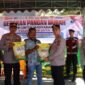 Kapolres Pidie Jaya AKBP Ahmad Pasaribu SH SIK MH, dalam gerakan pangan murah, Foto:Dok/Humas Polres Pidie Jaya 