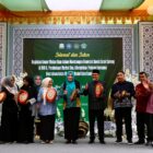 Ketua TP PKK Aceh Marlina Muzakir, selaku Ketua Forum Peningkatan Konsumsi Ikan (Forikan) Aceh, berkunjung ke Madrasah Ibtidaiyah Negeri 6 MIN Model Banda Aceh untuk mengkampanyekan Gerakan Memasyarakatkan Makan Ikan (Gemarikan), Sabtu (18/04/2026).